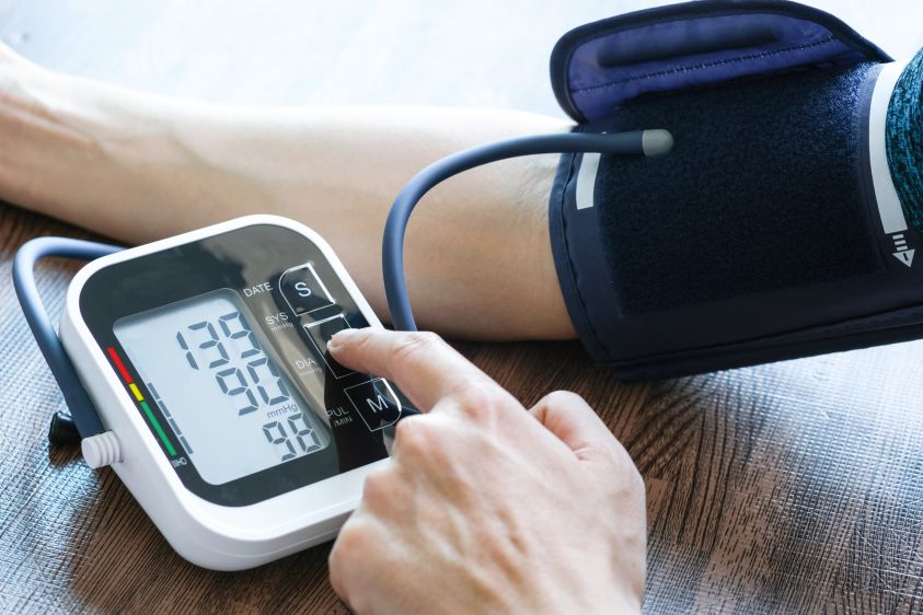 Man checks blood pressure monitor and heart rate monitor with digital pressure gauge2e00 Health care and Medical concept2e00